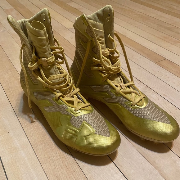 Under Armour gold cleats size 9.5